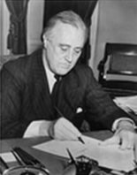 Franklin D. Roosevelt signs Housing Act